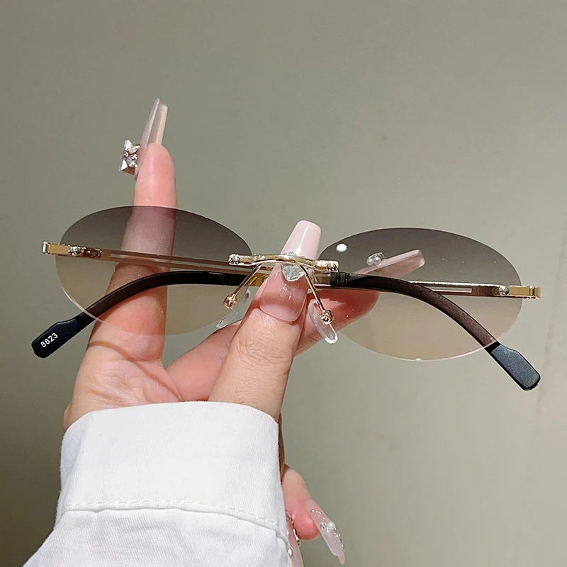 Vintage Outdoor Fashion - Lunettes de soleil ovales sans monture